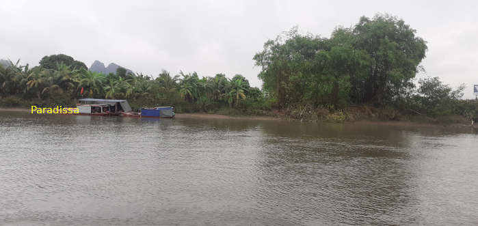 Thuy Nguyen by the riverside of the Kinh Thay River